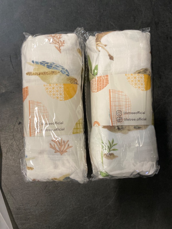 Photo 1 of LifeTree Muslin Swaddle Blankets, Baby Swaddling Wrap Nursery Blanket for Boys & Girls, Soft 70% Viscose from Bamboo and 30% Cotton, Large 47 x 47 inches, Sea Turtle & Dinosaur