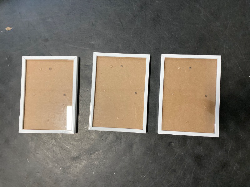 Photo 1 of upsimples 5x7 Picture Frame Set of 3, Made of High Definition Glass for 5 x 7 White Frames, Wall and Tabletop Display Thin Border Photo Frame for Home Décor