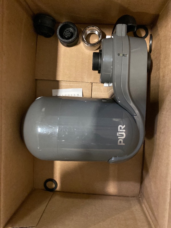 Photo 1 of PUR PLUS Vertical Faucet Mount Water Filtration System, Lead-Reducing Filter, Great-Tasting Water, Easy Install, Lasts 100 Gallons, Compatible with Sinks with External Aerators, Grey
