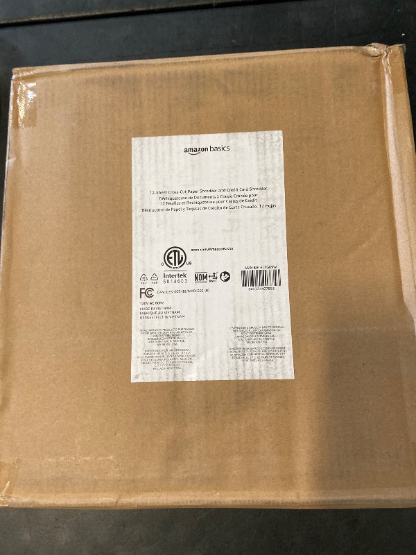 Photo 1 of Amazon Basics Cross Cut Paper and Credit Card Shredder, 12 Sheet (New Model), Black