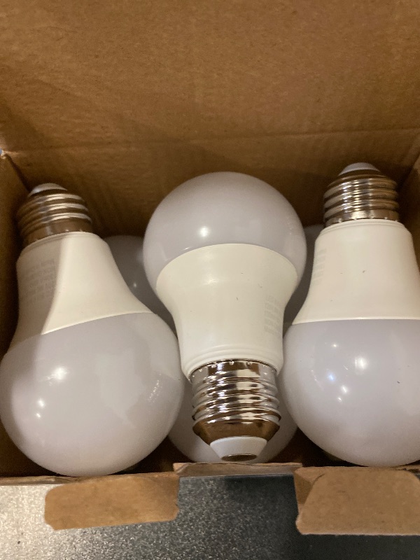 Photo 1 of Amazon Basics A19 LED Light Bulbs, 75 Watt Equivalent, Energy Efficient 12W, E26 Standard Base, Soft White 2700K, Dimmable, 10,000 Hour Lifetime , 6-Pack