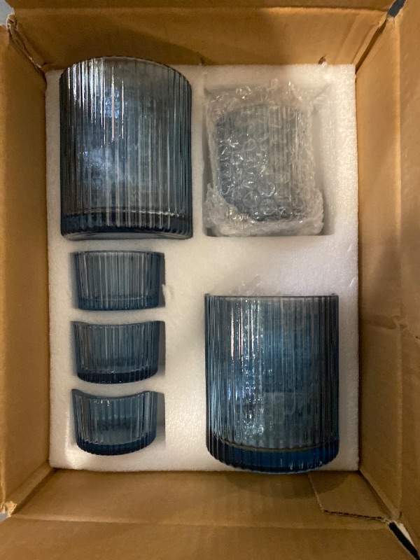 Photo 1 of MATAHUM 9Pcs Assorted Blue Votive Candle Holders Ribbed Tea Light Candle Holder Glass Blue Candle Holders for Bridal Shower, Wedding Table Centerpiece, Party Home Decoration