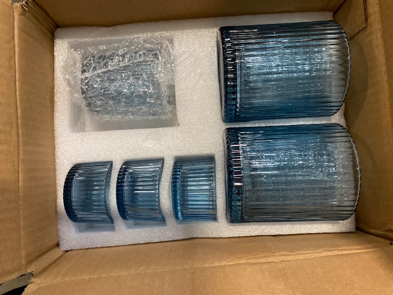 Photo 1 of MATAHUM 7Pcs Assorted Blue Votive Candle Holders Ribbed Tea Light Candle Holder Glass Blue Candle Holders for Bridal Shower, Wedding Table Centerpiece, Party Home Decoration