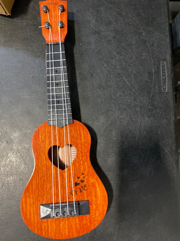 Photo 1 of YEZI Kids Toy Classical Ukulele Guitar Musical Instrument, Brown