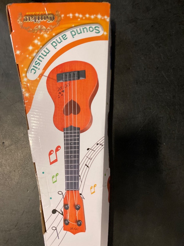Photo 1 of YEZI Kids Toy Classical Ukulele Guitar Musical Instrument, Brown