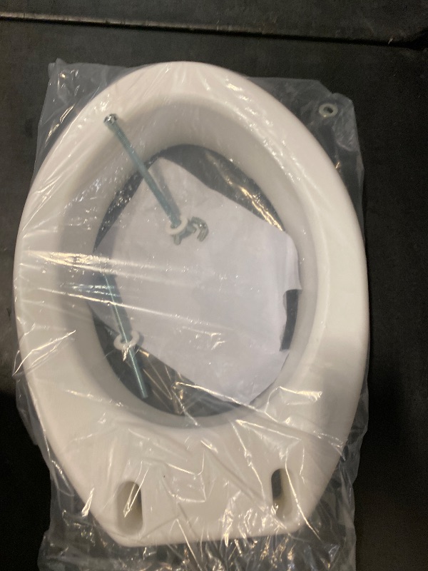 Photo 1 of Carex Toilet Seat Riser, Elongated Raised Toilet Seat Adds 3.5 inches to Toilet Height, for Assistance Bending or Sitting, 300 Pound Weight Capacity Toilet Riser