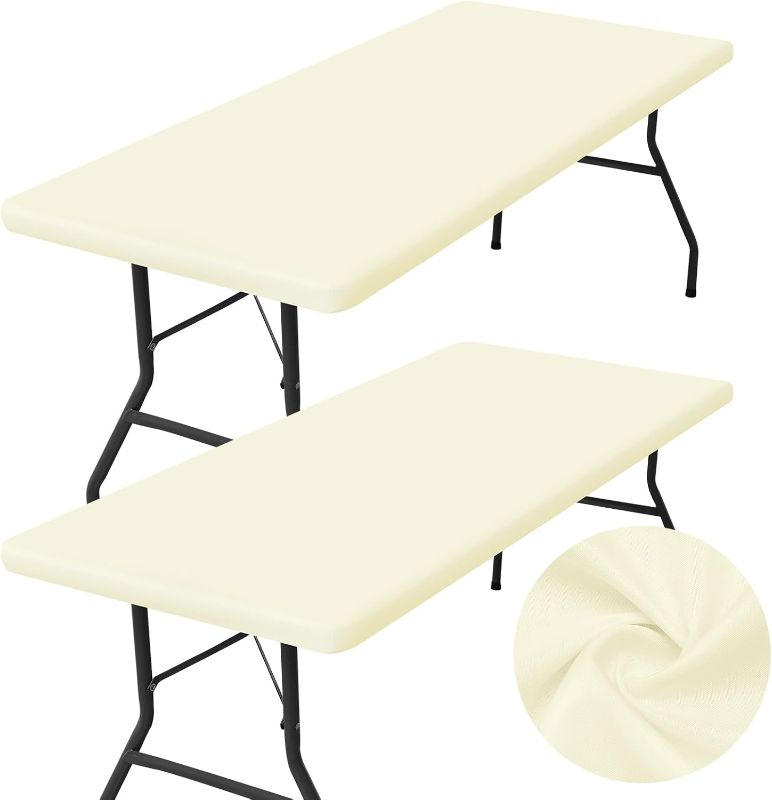 Photo 1 of homing 1 Pack Rectangle Table Cloth, Elastic Fitted Fabric Tablecloth Fits for 6 Foot Folding Tables, Washable Table Cover for Picnic, Camping, Indoor & Outdoor (Cream Yellow, 30" x 72")