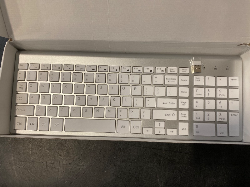 Photo 1 of Wireless Keyboard and Mouse Ultra Slim Combo, TopMate 2.4G Silent Compact USB 2400DPI Mouse and Scissor Switch Keyboard Set with Cover, 2 AA and 2 AAA Batteries, for PC/Laptop/Windows/Mac-Silver White