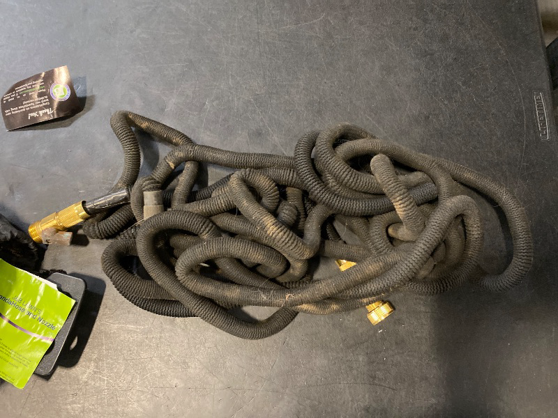 Photo 1 of Flexi Hose Lightweight Expandable Garden Hose, No-Kink Flexibility, 3/4 Inch Solid Brass Fittings and Double Latex Core (25ft, Black)
