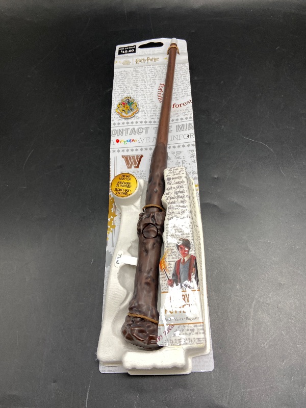 Photo 1 of Disguise Harry Potter Light Up Wand, Official Hogwarts Wizarding World Harry Potter Costume Accessory Wand with Illuminating Tip Brown 13.5 Inch Length