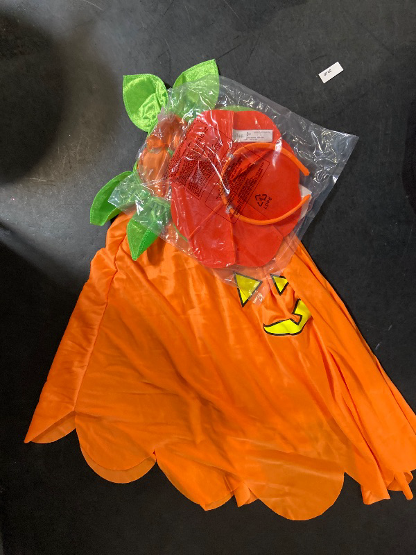 Photo 1 of One Size fits most Kids' Blacklight Responsive Pumpkin Poncho Halloween Costume Kit - Hyde & EEK! Boutique