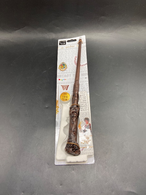 Photo 1 of  13.5 Inch Length- Disguise Harry Potter Light Up Wand, Official Hogwarts Wizarding World Harry Potter Costume Accessory Wand with Illuminating Tip Brown