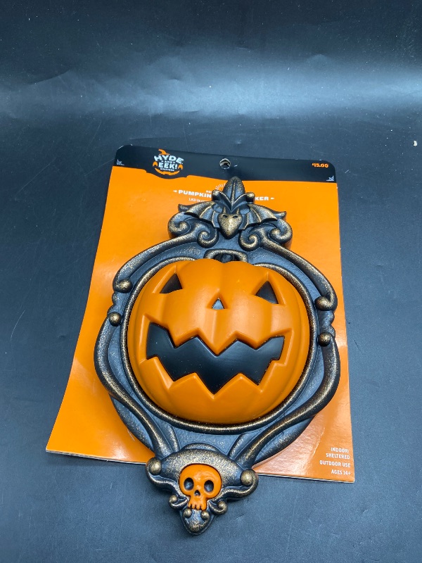Photo 1 of Animated Pumpkin Door Knocker Halloween Decorative Prop - Hyde & EEK! Boutique ?: Light-Up, Sheltered Outdoor Use, Includes Batteries