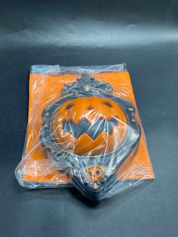 Photo 1 of Animated Pumpkin Door Knocker Halloween Decorative Prop - Hyde & EEK! Boutique ?: Light-Up, Sheltered Outdoor Use, Includes Batteries