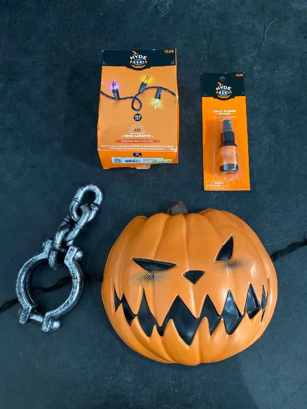 Photo 1 of Miscellaneous Halloween decorations ( Pumpkin Mask, Led lights, fake blood spray, fake hand chain) 