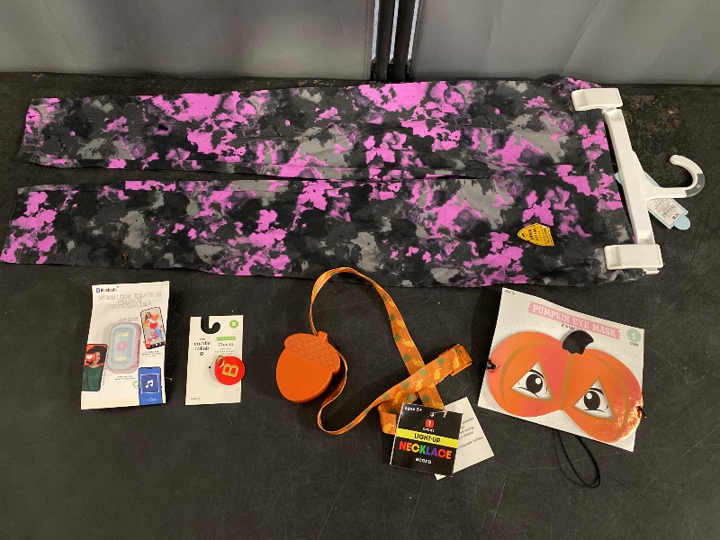 Photo 1 of 5 Miscellaneous Items ( Pumpkin Eye mask, Light up Acorn necklace, Wireless Phone controller, Cuddle collab charm (B), M(8) youth sweats) 
