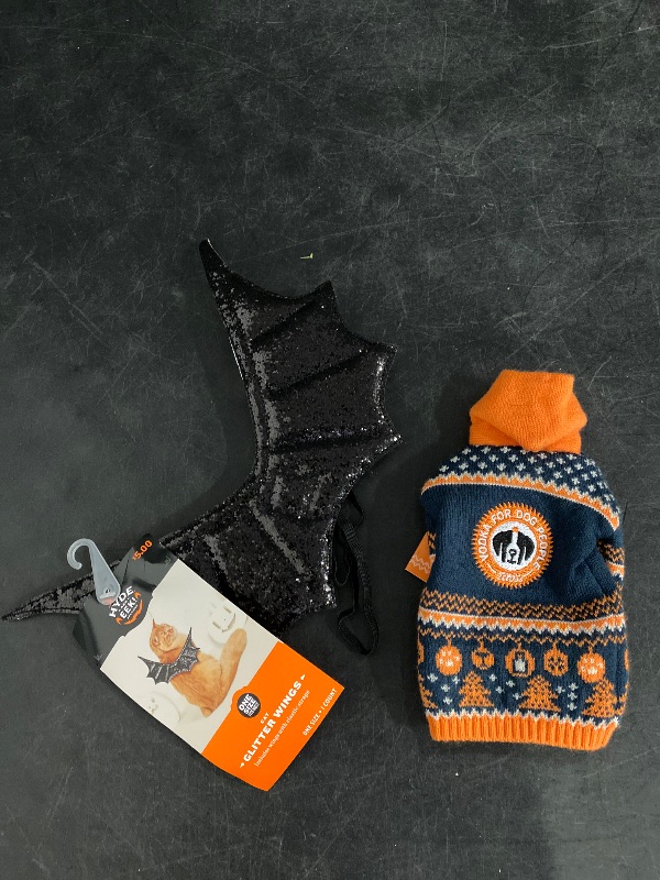 Photo 1 of Cat & Dog Costumes ( Cat glitter wings & (XS) Dog Titos Vodka Sweater) 