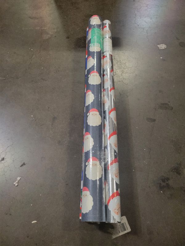 Photo 1 of 4 Rolls of Santa wrapping paper (125 sq.ft all together) 