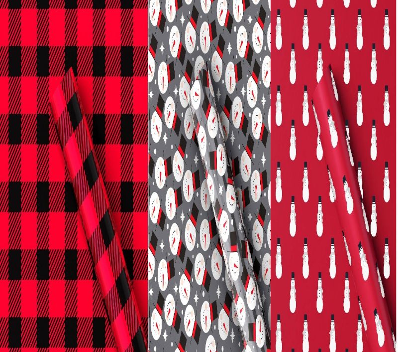 Photo 1 of 3 rolls of christmas wrapping paper ( 125 sq ft. all together) 