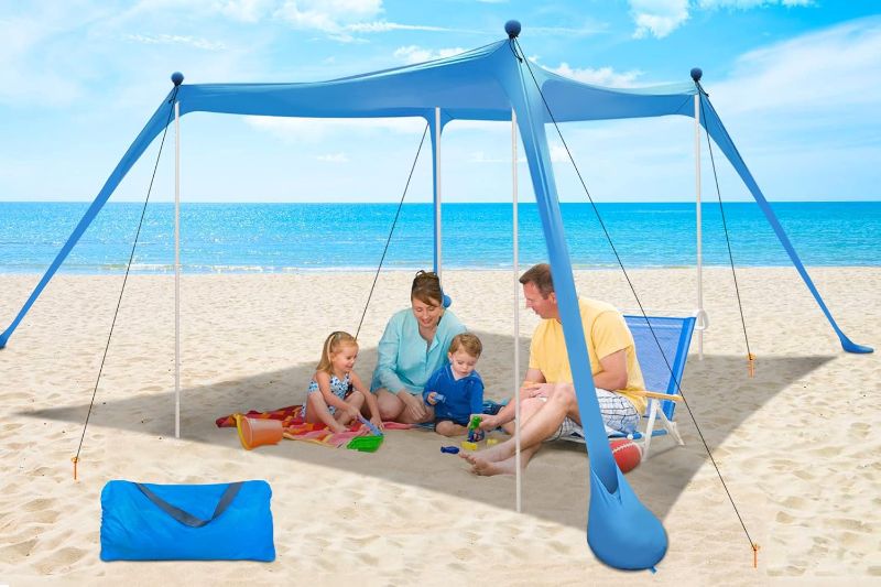 Photo 1 of Beach Canopy Beach Tent UPF50+ 11x11 FT Easy to Setup Extra Windproof Rope Sun Shelter Beach Shade Canopy with 4 Stability Poles Outdoor Shade for Beach Camping Family