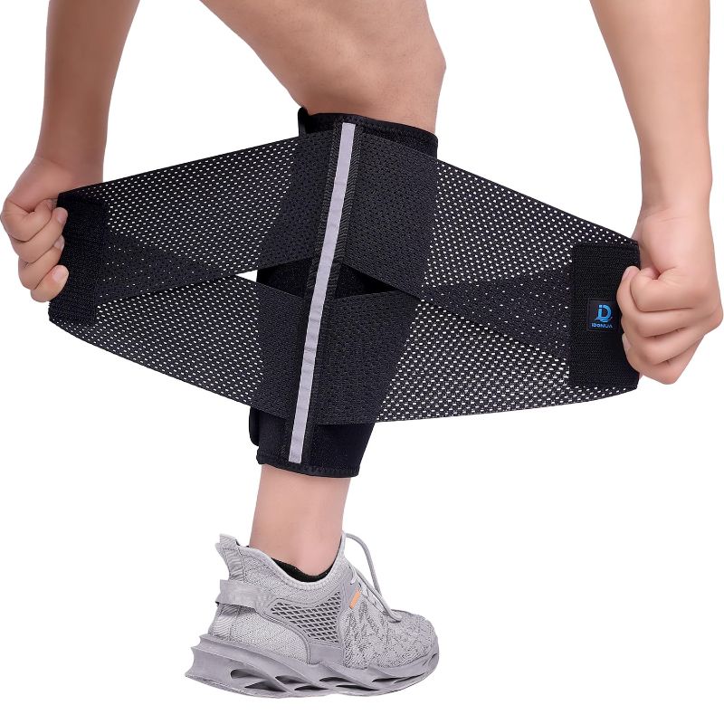 Photo 1 of Calf Brace Compression for Torn Calf Muscle fit Men & Women, Innovative 2 Layer Elastic Calf Support Bandage for Legs adds Extra Pressure for Strain, Swelling, Cramps, Varicose Vein -S/M