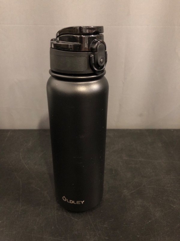 Photo 1 of Oldley Insulated Water Bottle 32oz Water Bottles with Straw, Stainless Steel Water Bottle with 3 Lids, Double Wall Vacuum Bottles for Adult,Sports Bottles for School Travel, Black
