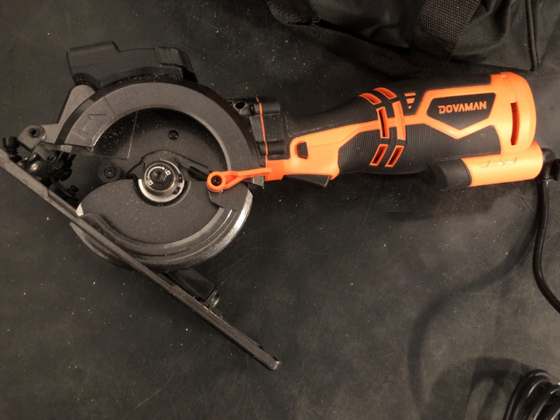 Photo 1 of DOVAMAN Circular Saw, 5.8A 4-1/2" Circular Saw w/Laser, Metal Auxiliary Handle, 6 Blades (4½", 4¾"), Cutting Depth 1-11/16" (90°), 1-3/8" (45°), Ideal for Wood, Soft Metal, Plastic, Tile - MCS01A
