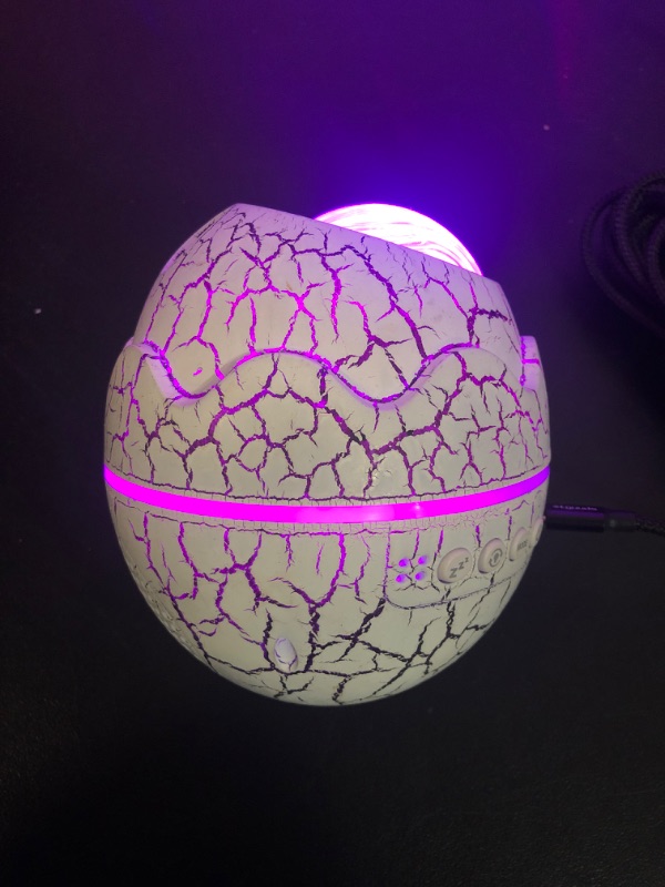 Photo 1 of Dinoglow Egg Projector, Dinoglow 4 in 1 Northern Lights Projector, Dino Glow Egg, Wireless Music Player Dinosaur Egg Light Projector, 24 Color Variations, The Light Changes With The Rhythm (#A)
