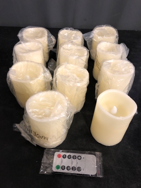 Photo 1 of antizer Flameless Candles Battery Operated Candles Set of 12 Ivory Real Wax Pillars Flickering Candles Ivory LED Flameless Candles with Remote and Timer Control (D: 3" x H: 4")
