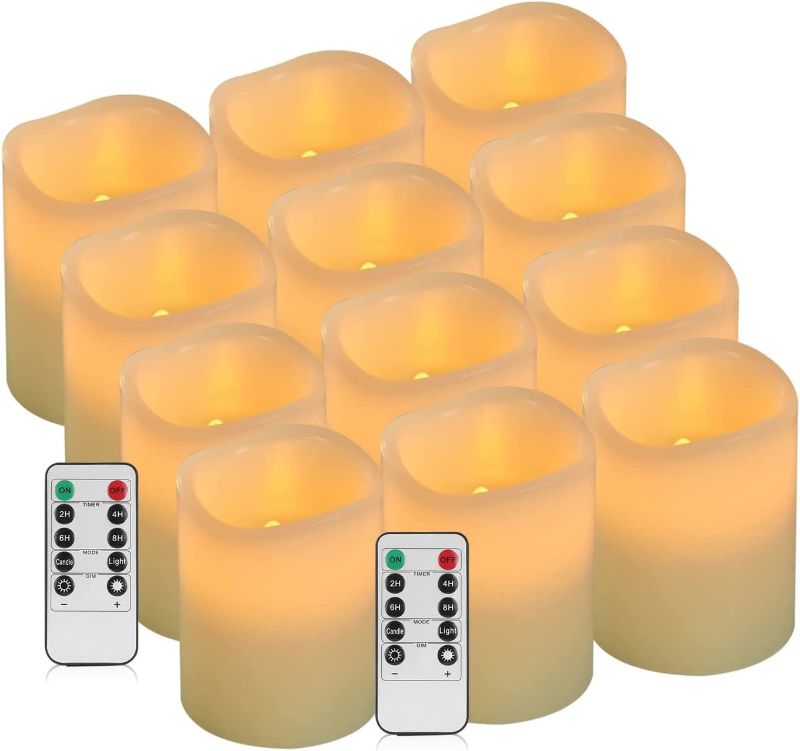 Photo 1 of antizer Flameless Candles Battery Operated Candles Set of 12 Ivory Real Wax Pillars Flickering Candles Ivory LED Flameless Candles with Remote and Timer Control (D: 3" x H: 4")
