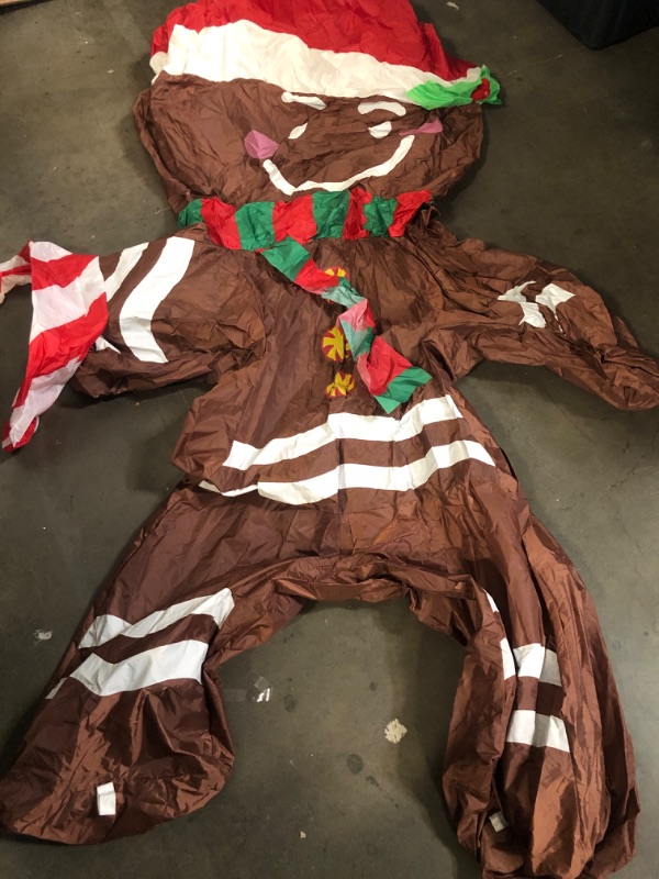 Photo 1 of Christmas Inflatable Snowman/Nutcracker/Santa Claus Lighted Blow Up Christmas Yard Decoration with Built in Fan and Anchor Ropes (Gingerbread Man)