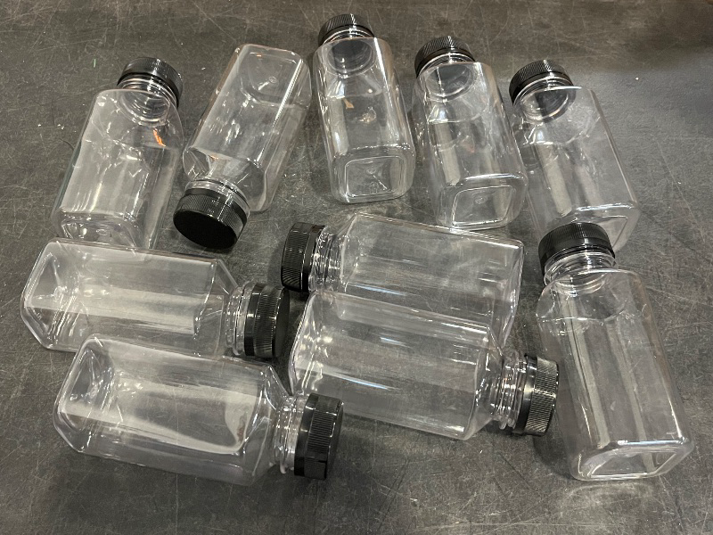 Photo 1 of 10 Pcs 8 oz Plastic Juice Bottle Reusable Transparent Bulk Beverage Containers with Black Lids for Juice, Drinking Milkshake Tea, Milk, Juicing Smoothie Water and Other Beverages, Fridge Storage