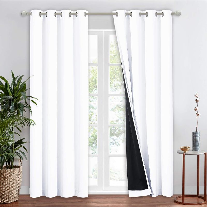 Photo 1 of NICETOWN 100% Blackout Window Curtain Panel, Cold and Full Light Blocking Drape with Black Liner for Nursery, 84 inches Drop Thermal Insulated Draperies (White, 1 Piece, 52 inches Wide Each Panel)
