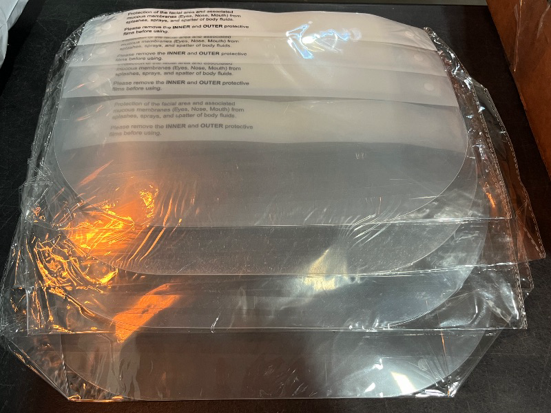 Photo 1 of Adjustable Clear Face Shield (4 Pack) – Full-Face Protection with White Headband – Anti-Fog, Reusable Safety Visor for Construction, Lab, and Industrial Use – Lightweight, Comfortable Fit