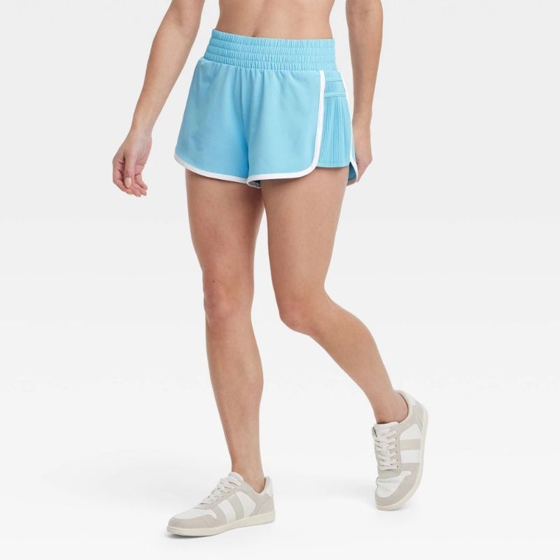 Photo 1 of (XS) Women's Woven Mid-Rise Piped Dolphin Shorts 2.5" - All in Motion™ Blue XS: Lightweight, Moisture Wicking, Quick Dry
