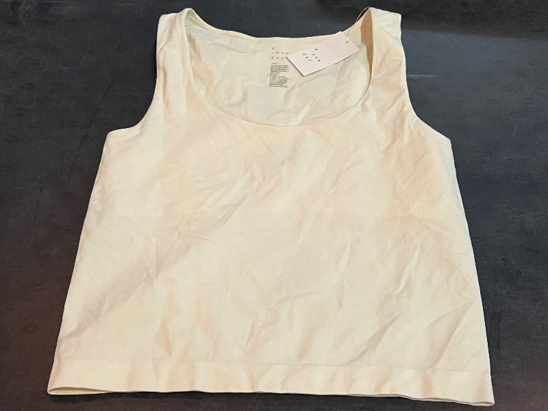 Photo 1 of (L) Women's Slim Fit Seamless Tank Top - a New Day™ Off-White L: Lightweight Sleeveless Scoopneck Pullover
