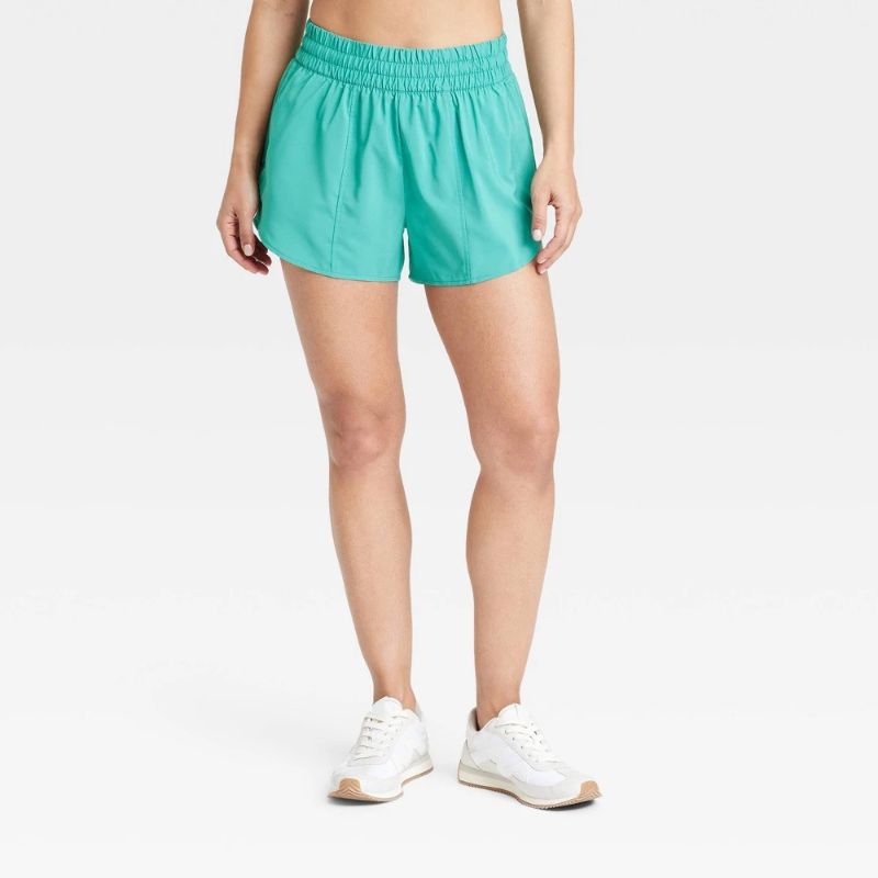 Photo 1 of (M) Women's Woven Mid-Rise Run Shorts 3" - All in Motion™ Teal Green M: Lightweight, Adjustable Waistband, Quick Dry

