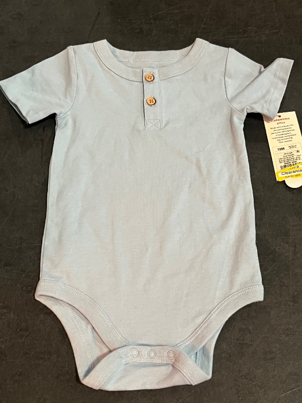 Photo 1 of 12M Baby Boys' Henley Bodysuit - Cat & Jack™ Light Blue 12M: Cotton Blend, Recycled Polyester, Spandex, Short Sleeve, Snap Closure