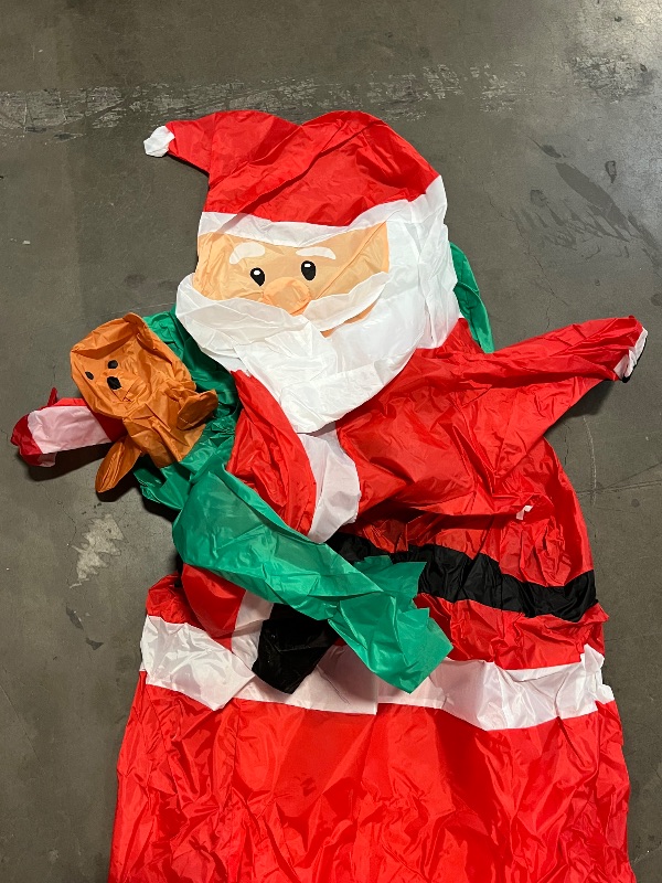 Photo 1 of Giant Christmas Inflatables Outdoor Decorations - LED Lighted Blow Up Santa Claus with Gift for Yard, Garden & Lawn - Inflatable Santa with Rotating Lights for Holiday Xmas Party Decor