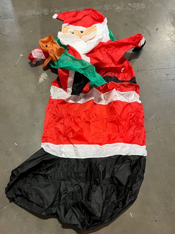 Photo 1 of Giant Christmas Inflatables Outdoor Decorations - LED Lighted Blow Up Santa Claus with Gift for Yard, Garden & Lawn - Inflatable Santa with Rotating Lights for Holiday Xmas Party Decor