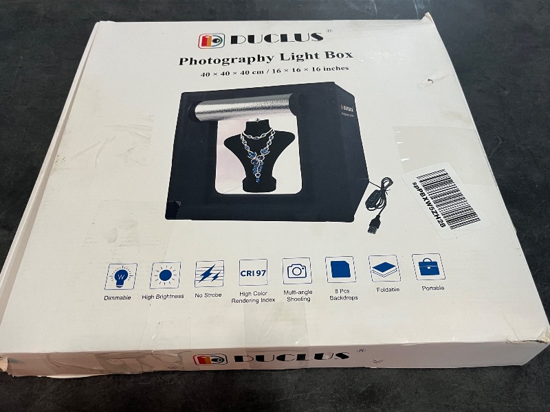Photo 1 of DUCLUS Light Box Photography, 16x16 inch Portable Photo Studio Box with 160 LED Dimmable Lights, 6 PVC & 2 Paper Backdrops for Product Photography.