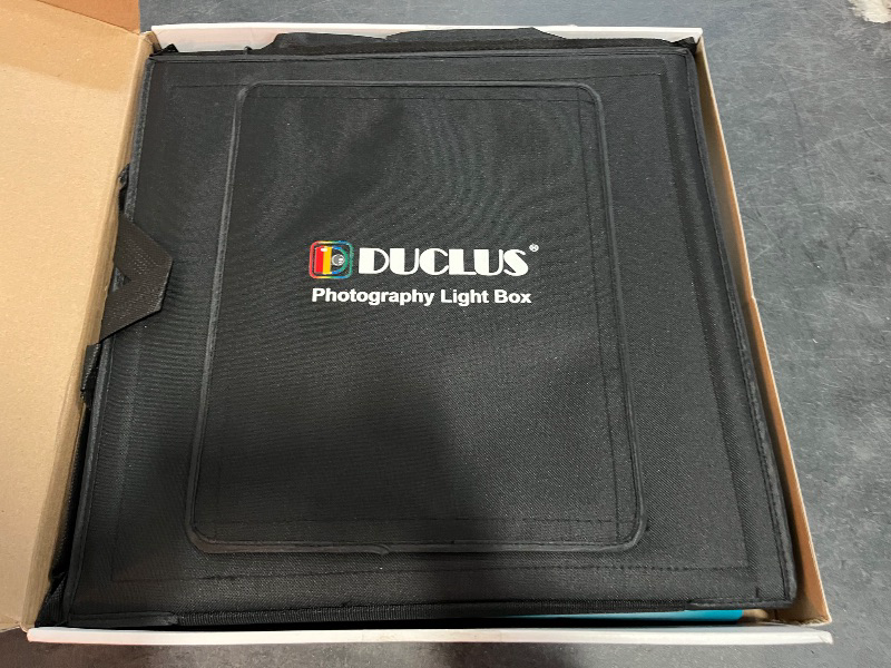 Photo 1 of DUCLUS Light Box Photography, 16x16 inch Portable Photo Studio Box with 160 LED Dimmable Lights, 6 PVC & 2 Paper Backdrops for Product Photography.