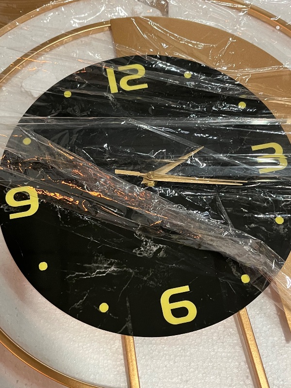 Photo 1 of QUINTO Modern Wall Clocks for Living Room Decor- Silent Wall Clock Decorative Wall Watch for Kitchen, Bathroom, Bedroom, Office, Home,Black
