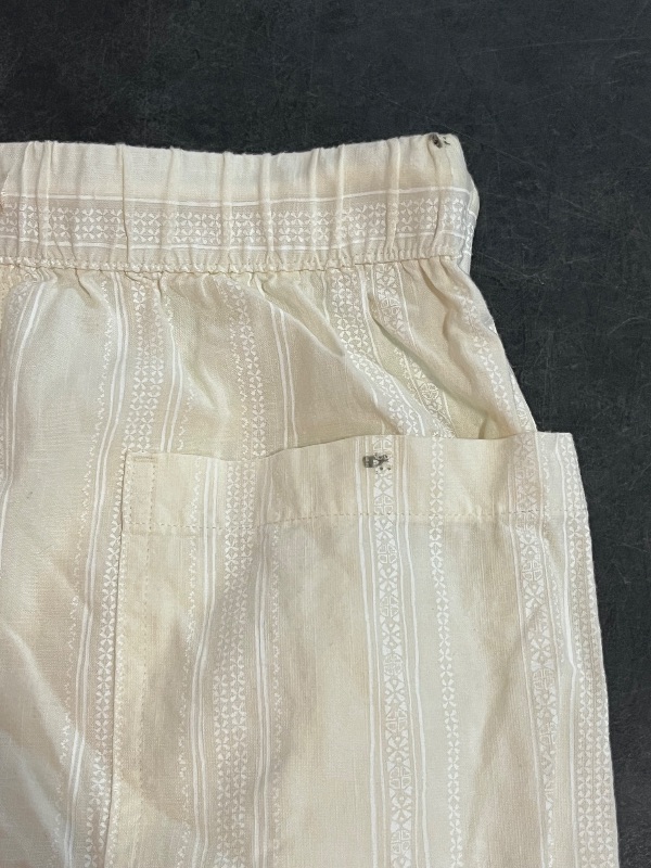 Photo 1 of (M) Women's High-Rise Pull-on Shorts - Universal Thread™ Cream M

