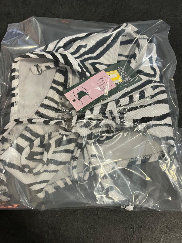 Photo 1 of (XL) Women's Textured Low-Rise High Leg Cheeky Side-Tie Bikini Bottom - Wild Fable™ Black/White Zebra Print XL: Jacquard Knit, Full Lining
