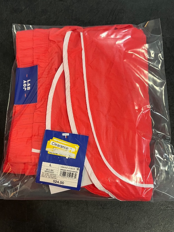 Photo 1 of (L) Women's Woven Mid-Rise Shorts - JoyLab™ Coral Orange L
