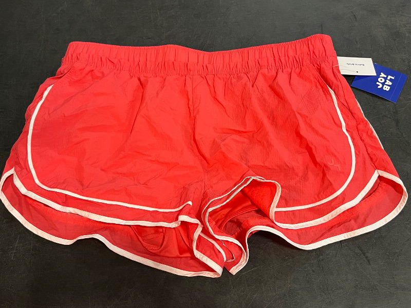 Photo 1 of (L) Women's Woven Mid-Rise Shorts - JoyLab™ Coral Orange L
