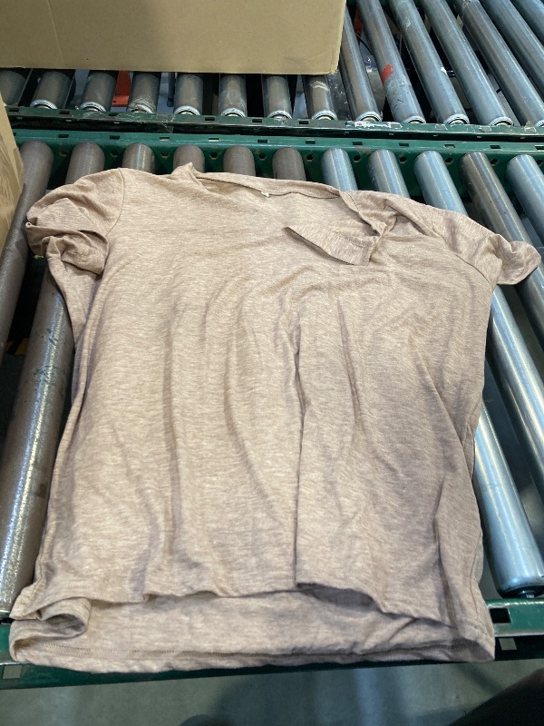Photo 1 of Womens T shirt size xl 