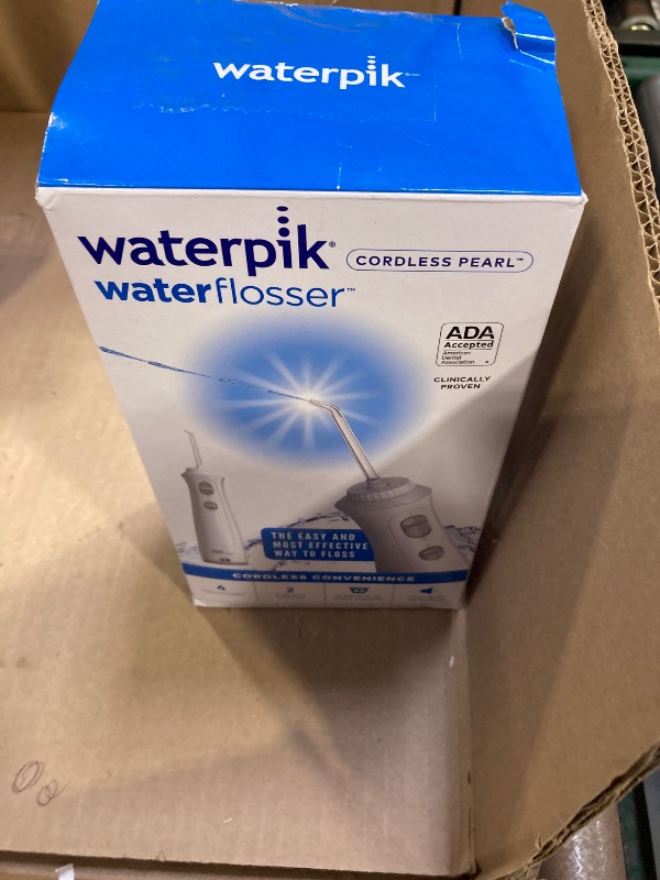 Photo 1 of Waterpik Cordless Pearl Rechargeable Portable Water Flosser for Teeth, Gums, Braces Care and Travel with 4 Flossing Tips - ADA Accepted, WF-13 White,
