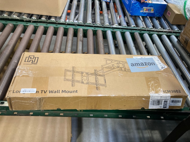 Photo 1 of HCMOUNTING Long Arm TV Wall Mount for 42-80 inch TVs, Full Motion with 43 inch Extension Articulating Arms, Swivel and Tilt TV Bracket, Holds up to 110 lbs, Max VESA 600x400mm